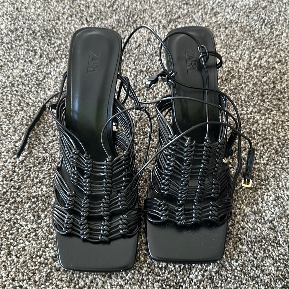 Black strapped heels